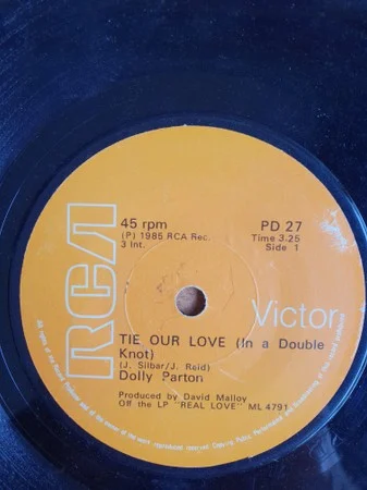 Dolly Parton: Tie Our Love (in a Double Knot) / Real Love single cover