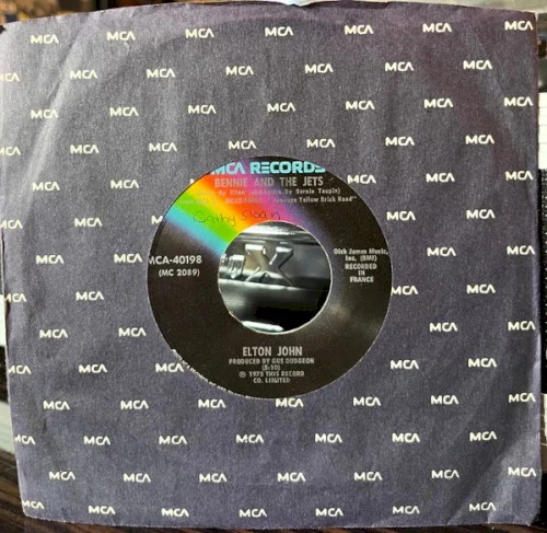 Bennie And The Jets / Harmony single cover by Elton John, released 1973 on MCA Records
