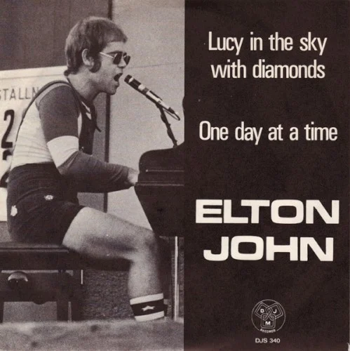 Lucy in the Sky With Diamonds / One Day at a Time single cover by Elton John, released 1974 on DJM Records