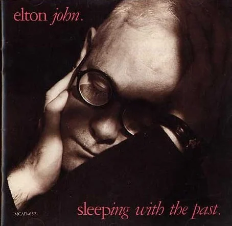 Sleeping With the Past album cover by Elton John, released August 7, 1989 on PolyGram, Mercury Records, The Rocket Record Company