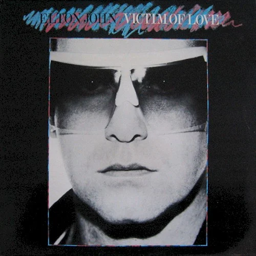 Victim of Love album cover by Elton John, released October 13, 1979 on Rocket Recordings, Phonogram, The Rocket Record Company